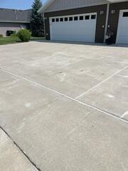 During: Our Foreman, Charlie, and his crew worked hard to secure all the products throughout the exterior concrete.
