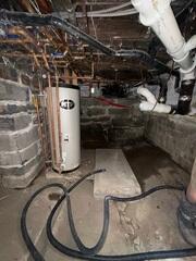 This old, wet basement in East Ryegate, Vermont, made the home an unhealthy environment.