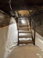 CleanSpace was installed across the basement floor and halfway up the foundation walls. The durable liner provides a clean, bright surface and helps isolate the basement from moisture associated with the older floor and walls.