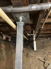 SmartJacks are adjustable steel support posts designed to stabilize weakened or undersupported crawl space floor systems. Their galvanized construction provides a durable solution for the challenging conditions commonly found beneath homes.