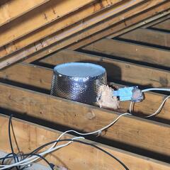 We installed airtight can light covers over the recessed (can) lights and used ZypFoam sealant to seal cracks and gaps around each fixture, preventing conditioned air from escaping into the attic and improving the home's energy efficiency.