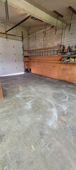 During: Our Foreman and his crew successfully lifted and leveled the garage floor.