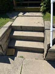 Luana, IA, Sinking Shop Floor and Front Steps Leveled
