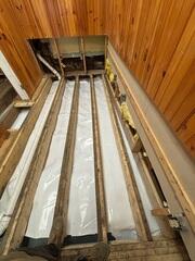 CleanSpace is a durable crawl space liner installed across the ground and secured throughout the crawl space. It separates the home from exposed earth, reduces the movement of ground moisture into the space, and creates a cleaner, brighter environment beneath the home.