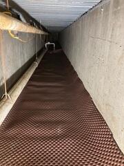 During: Our Foreman, Emmanuel, and his crew worked hard to secure all the products throughout the crawl space.