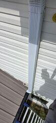 Downspout through deck