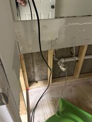 Water damage cleanup and dry out. Flood cuts, drying fans, and decontamination.