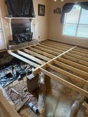 Sub floor replacement in progress. Main beam and sister joist replacement.