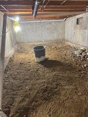 This dirt crawl space in East Randolph, Vermont, left the home exposed to dirty air and humidity