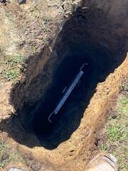 The earth anchor is placed and connected to the interior wall plate