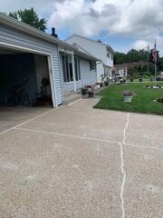 After our crew lifted and leveled the driveway and walkway and sealed the joints and cracks