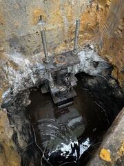 Push Pier that is used to lift and stabilize a  home's foundation.