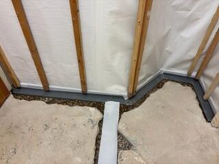 During: Our Foreman, Juan, and his crew successfully secured all the products throughout the basement.