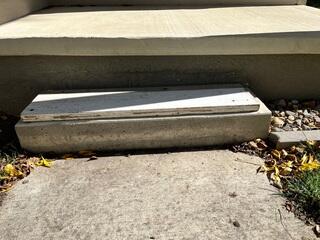 Sunken Sidewalk and Steps Leveled in Oelwein, IA