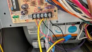 The Breathe EZ Air Cleaner is wired to the HVAC control board and uses electricity to create a charge that traps particles.