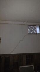 Before: Our Design Specialist, Derek, traveled to the home to take a closer look at the damaged walls.