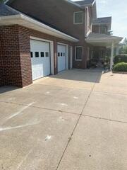 During: Our Foreman, Dylon, and his crew successfully lifted and leveled the sidewalk back to its original position.