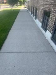 Before: Our Design Specialist, Ian, recommended installing PolyLevel beneath the sinking slabs.