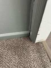 This home's foundation is settling in the soil, causing damage to the interior door frames since the home is shifting.
