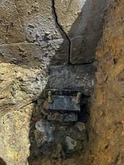 Push Piers  are steel pipes that are pushed deep into the ground, where they reach stronger soil. Brackets connect the piers to the foundation footing.