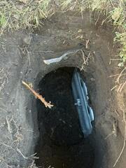 The earth anchor is placed and connected to the interior wall plate using a small steel pole which runs through the ground