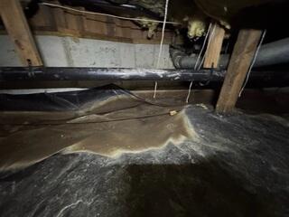 Evaporated water on vapor barrier