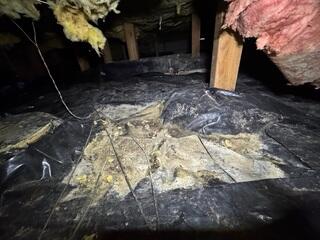 Damaged vapor barrier