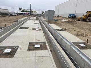 Helical piles installed with steel rebar placed