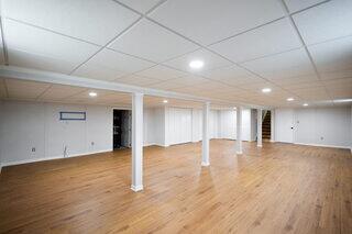 EverLast wall panels were installed to create the finished basement walls, providing a durable alternative to traditional drywall that is designed for below-grade spaces.