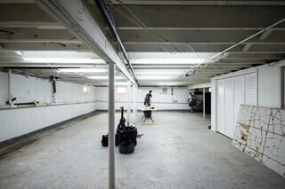 A homeowner in Metuchen, NJ wanted to transform a blank 1,000 to 1,200 square-foot basement into a finished recreational space.