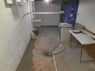 During: Our Foreman, Kiko, and his crew worked hard to waterproof the entire basement.