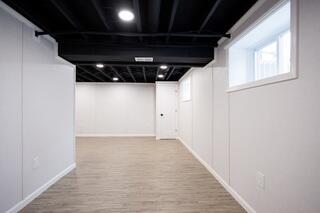 ThermalDry Elite Plank Flooring was installed to give the floor the look of finished plank flooring while being designed for below-grade environments.