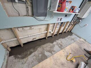 After our crew installed WaterGuard along the edges of the floor and restored the flooring