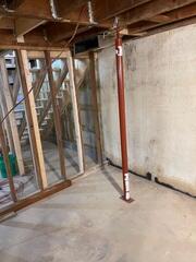 The basement where water stains can be seen along the foundation wall
