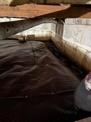During: Our Foreman, Nanga, and his crew worked hard to secure all the products throughout the basement.