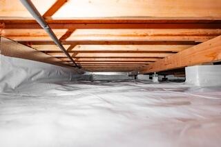 We installed CleanSpace over the crawl space floor to create a durable barrier between the ground and the space above, helping control moisture vapor from the soil. SilverGlo insulation panels were installed along the crawl space walls to help improve the thermal performance of the space.