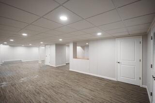 ThermalDry Elite Plank Flooring gives this newly finished basement the appearance of a traditional finished floor while being designed with below-grade environments in mind. The flooring helps complete the transformation from unfinished basement to comfortable living space.