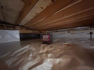 SaniDry Dehumidifier - A high-performance dehumidification system designed specifically for basement and crawl space environments. It removes excess moisture from the air and automatically maintains appropriate humidity levels.