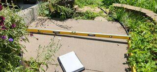 How much the slab would need to be lifted in order for it to be level