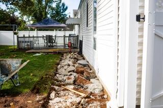 With the original sidewalk completely removed, the full extent of the area being rebuilt is visible. Starting with a clean work area allowed our team to address the walkway as a complete replacement rather than simply patching the existing concrete.