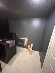 The homeowner removed a portion of the drywall that had been water damaged.