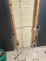 During the inspection, our inspector confirmed that a large vertical crack behind the wall was causing water to seep into the basement.