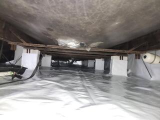 CleanSpace is a white liner that is laid on the crawl space ground to separate the house from the earth.