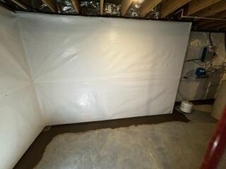Lastly, the crew re-concretes the floors around the basement perimeter, leaving a gap between the floor and the wall to allow water to drain into the system.