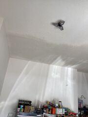 After: Popcorn texture applied over the repaired ceiling sections to match the surrounding existing texture.