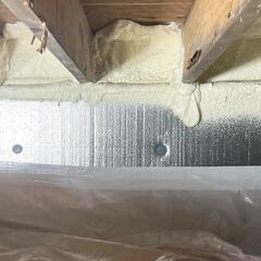 The rim joists and sill plate were spray foamed, rigid foam boards were installed along the cinder block walls, and a durable vapor barrier was laid across the crawl space floor.