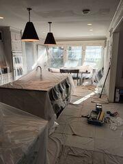 New drywall installed and the repaired area being taped and finished.