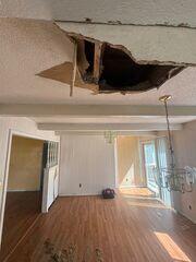 Wide view of the large opening in the center of the ceiling.