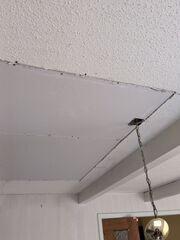 New drywall installed to close the ceiling opening.