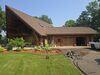 St Cloud Log Home Needs Gutters - Photo 1